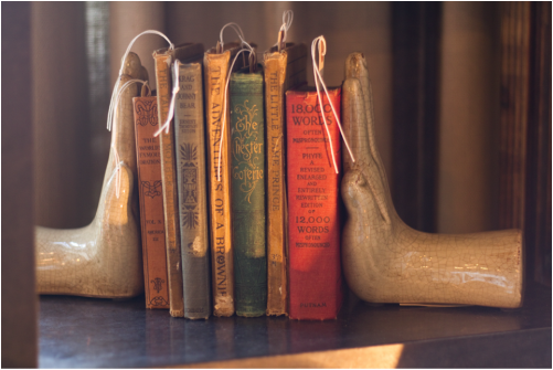 Antique books, hand bookends